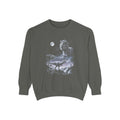 Airbrushed 1990s-style art of a t-rex howling at the moon, cold moonlight tones on black, retro nature-tee style.