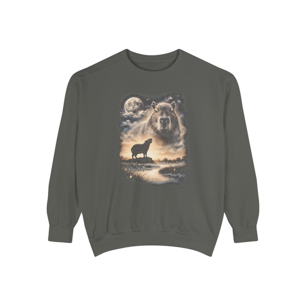 Dark crewneck with airbrushed capybara portrait above a small capybara howling at a full moon over misty ground