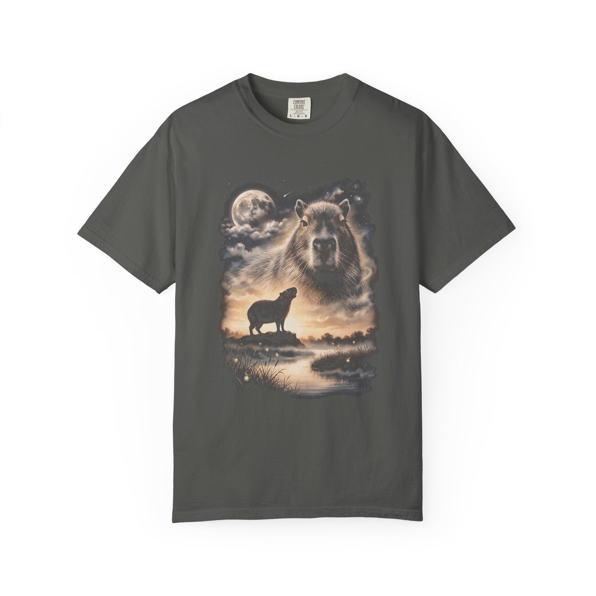 Photorealistic double-exposure design of a capybara howling at a full moon over misty hills, in cream and gold on a dark tee.