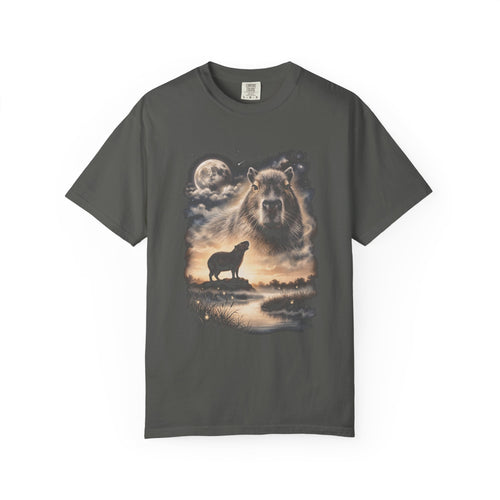 Photorealistic double-exposure design of a capybara howling at a full moon over misty hills, in cream and gold on a dark tee.