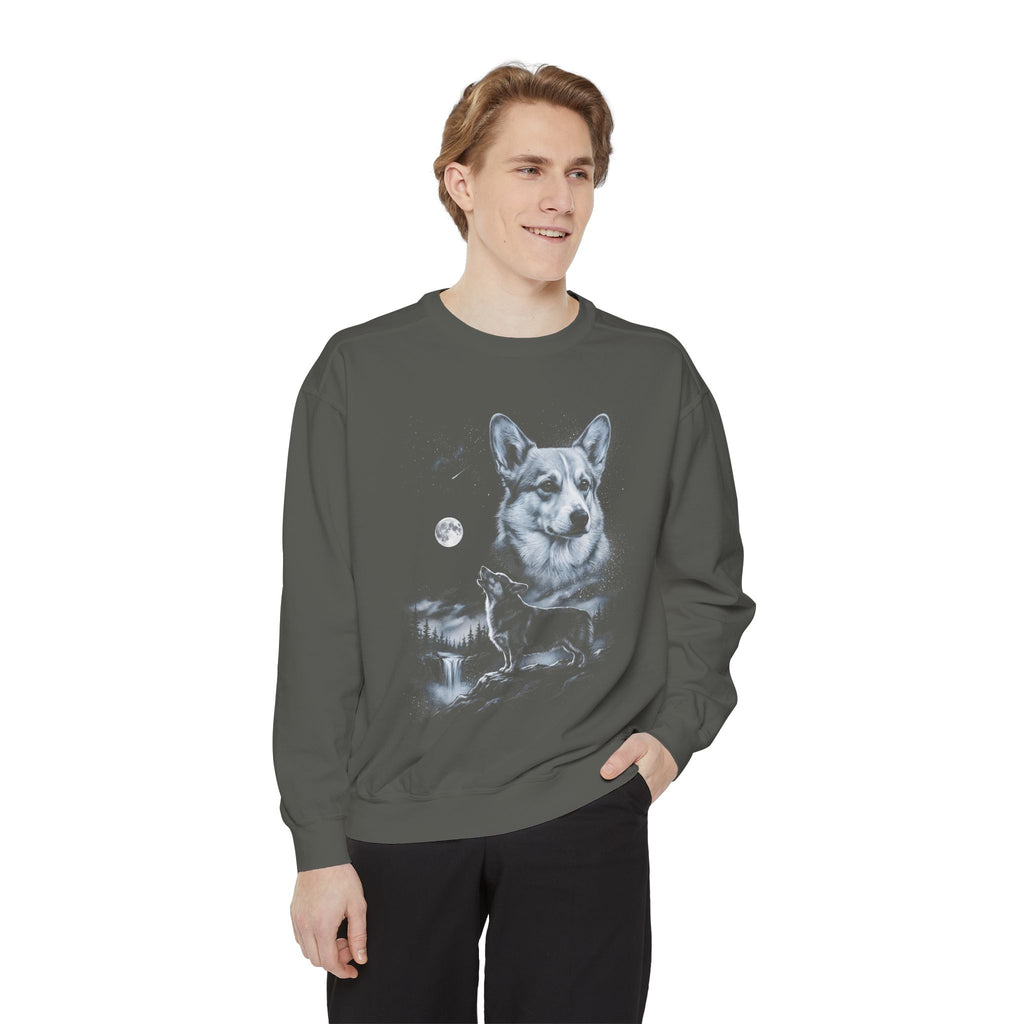 Airbrushed 1990s-style corgi howling at a cold moonlit sky, in ash grey and icy blue on black.
