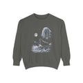 Airbrushed black-and-white illustration of a tusked walrus howling at a pale moon in cold moonlight tones.