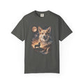 Dark tee with cream and gold double-exposure art of a corgi howling at a full moon over misty hills