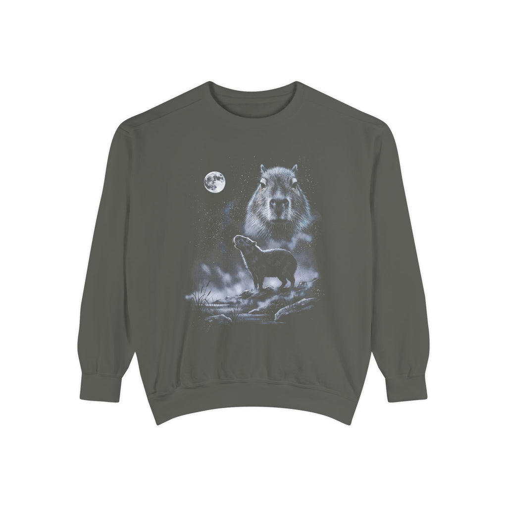 Retro airbrushed capybara howling at the moon in cold moonlight tones on black, 1990s nature-tee style.