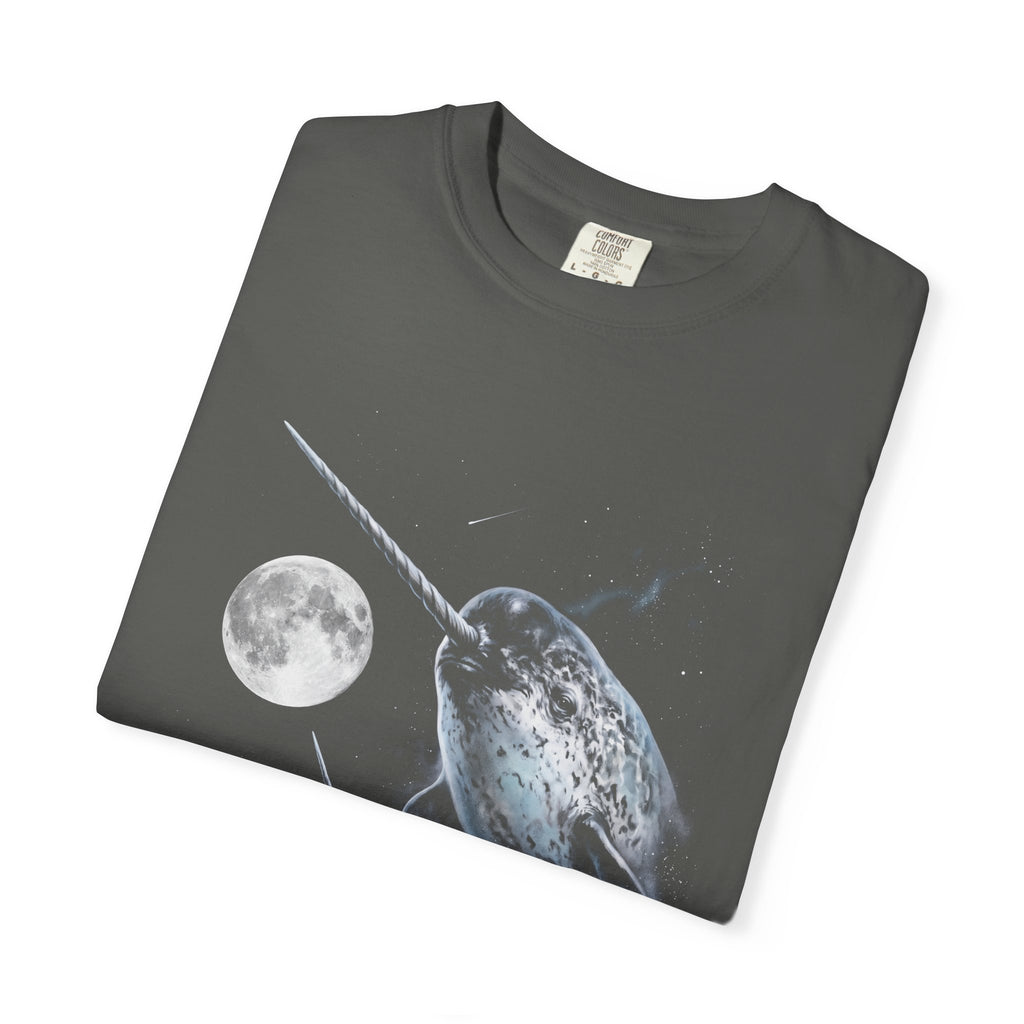 Airbrushed 1990s-style narwhal howling at the moon in cold monochrome blues and greys on black tee.