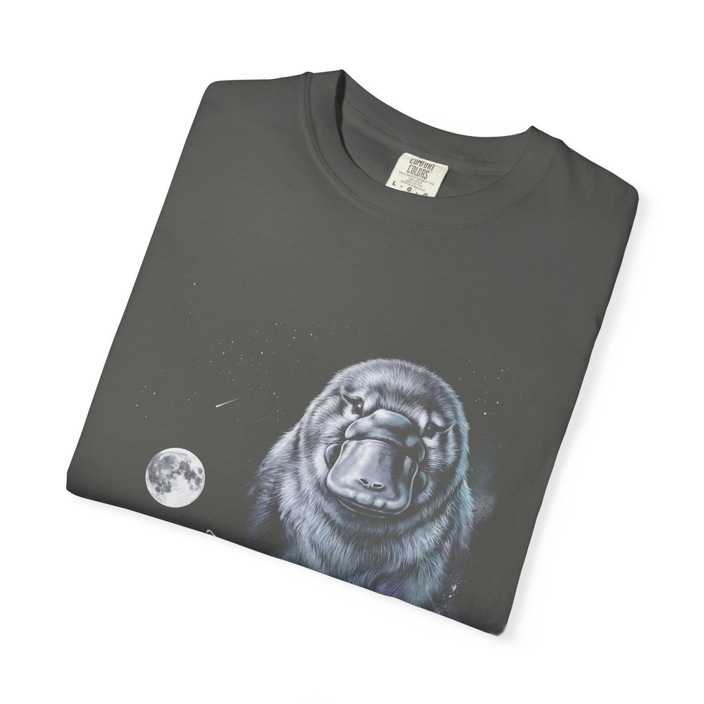 Airbrushed platypus howling at a cold monochrome moon, in classic 1990s nature-tee art style, on black.