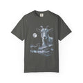 Airbrushed illustration of a goat howling at a cold moonlit sky, in white, silver, and ice-blue tones on black.