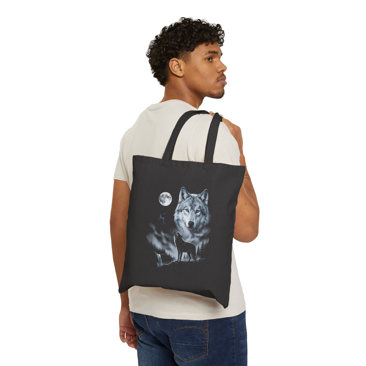 Retro airbrushed wolf howling at the moon in cold silver, ash grey and ice blue on black.