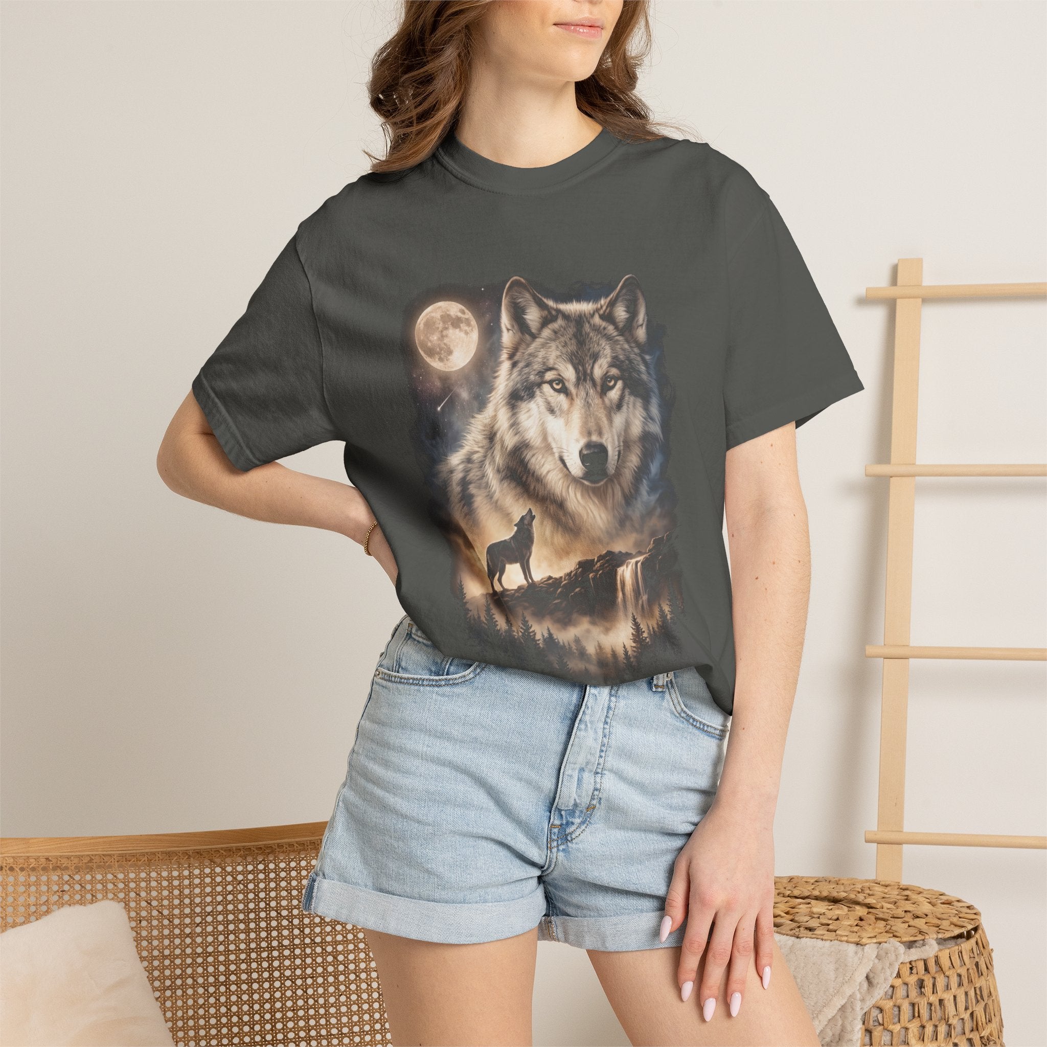 Dark t-shirt with airbrushed double-exposure wolf portrait above a wolf howling at a full moon over misty hills